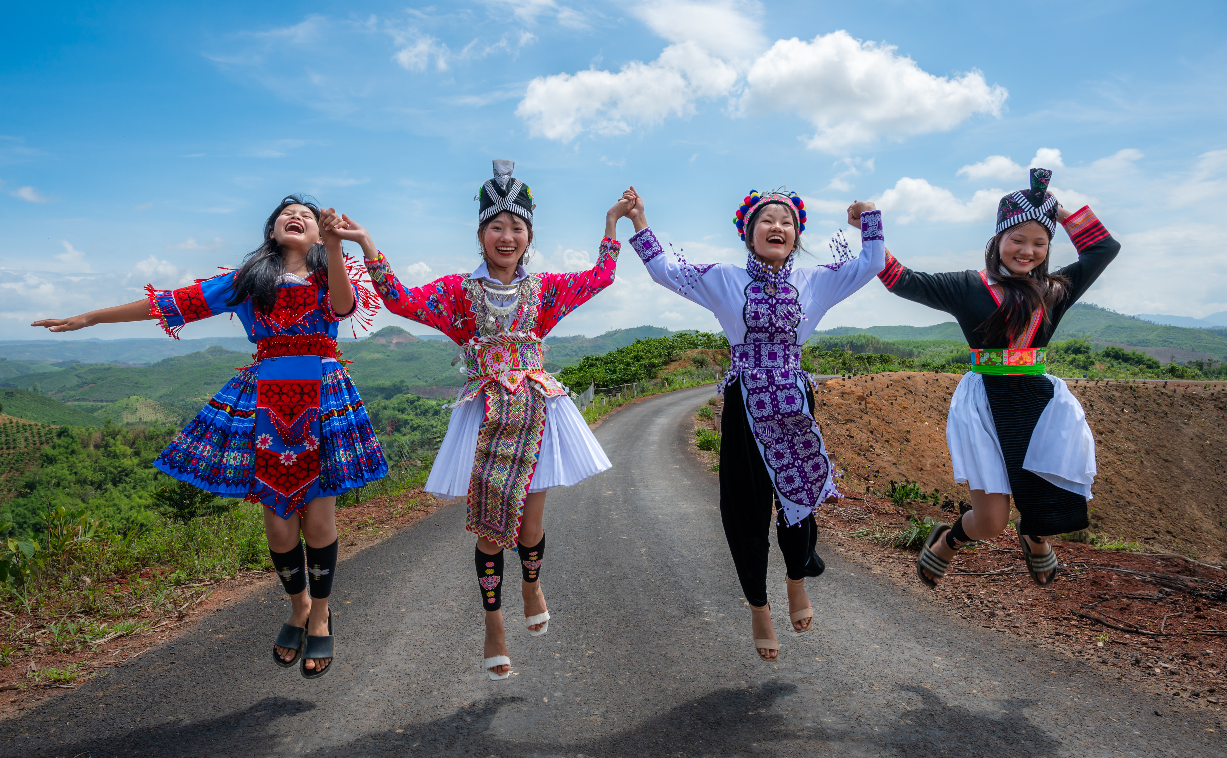 Hmong girls frolicking on the street